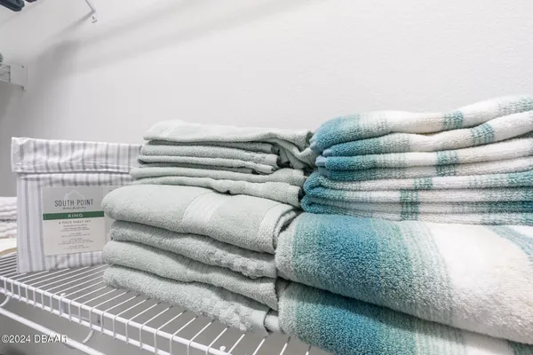 an aerial view of a house with garden space and street view