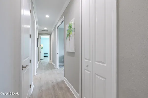 an aerial view of residential houses with yard