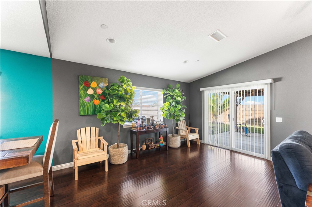 37068 Waltham Place Palmdale, CA 93550 - Photo 9 of 36 a view of a livingroom with furniture window and wooden floor