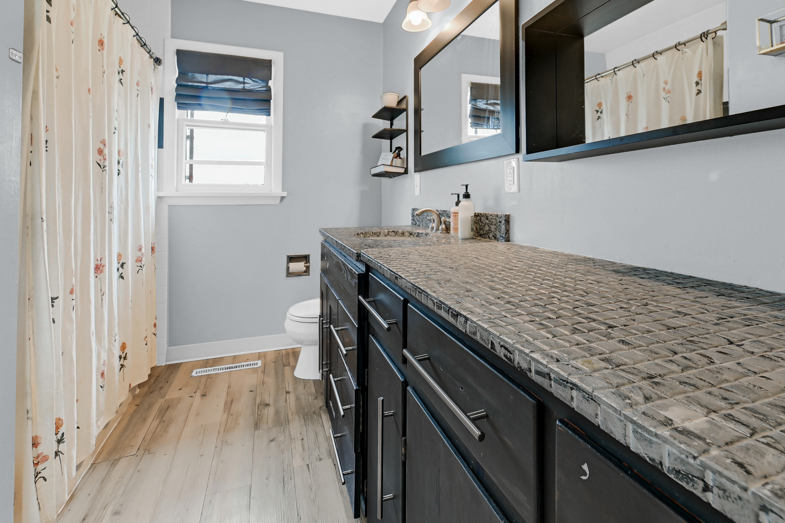 59 North 2750W Road Kankakee, IL 60901 - Photo 11 of 19 a kitchen with granite countertop a sink cabinets and wooden floor