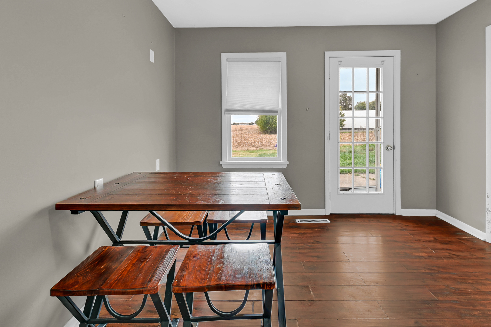 59 North 2750W Road Kankakee, IL 60901 - Photo 12 of 19 a view of a livingroom with furniture window and wooden floor