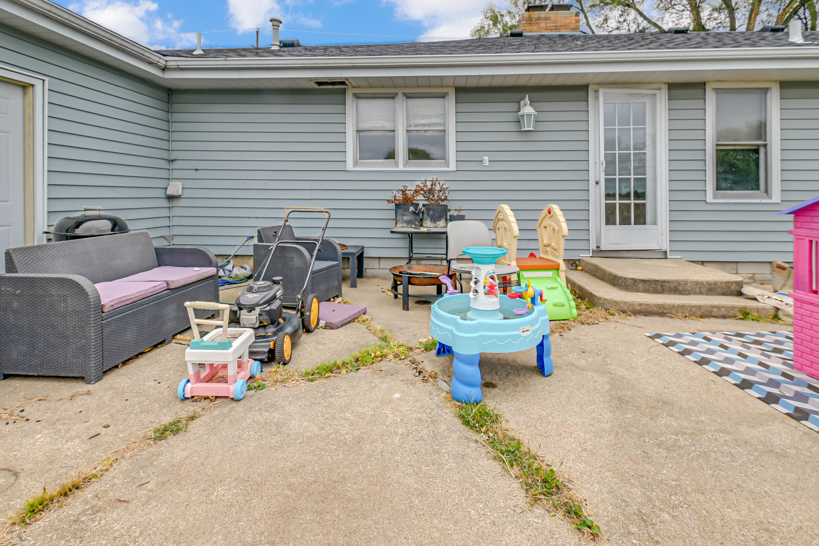 59 North 2750W Road Kankakee, IL 60901 - Photo 16 of 19 a view of a patio with dining table and chairs