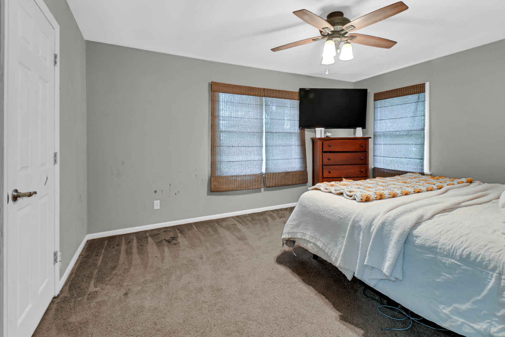 59 North 2750W Road Kankakee, IL 60901 - Photo 9 of 19 a bedroom with a bed and a chandelier