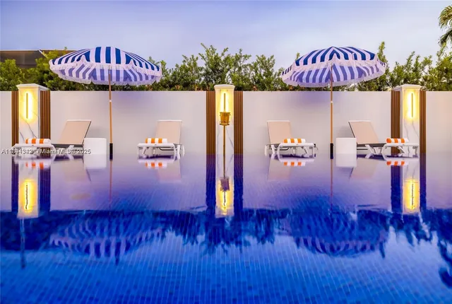 a view of a hall with sitting area