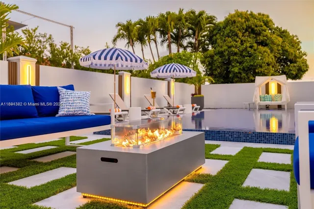 a view of a swimming pool with a patio