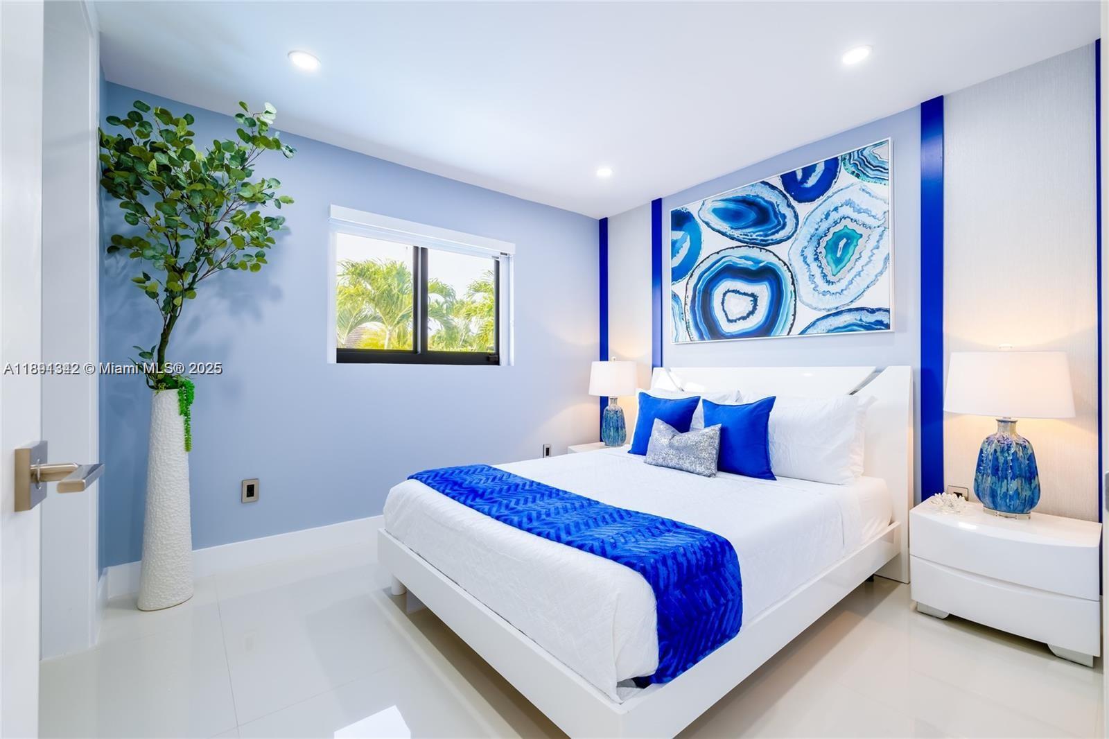 3221 Southwest 140th Avenue Miami, FL 33175 - Photo 17 of 19 a bedroom with bed and a window