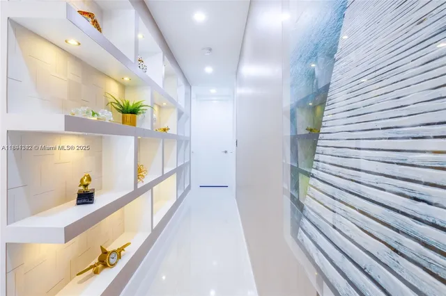 a view of hallway with washer and dryer