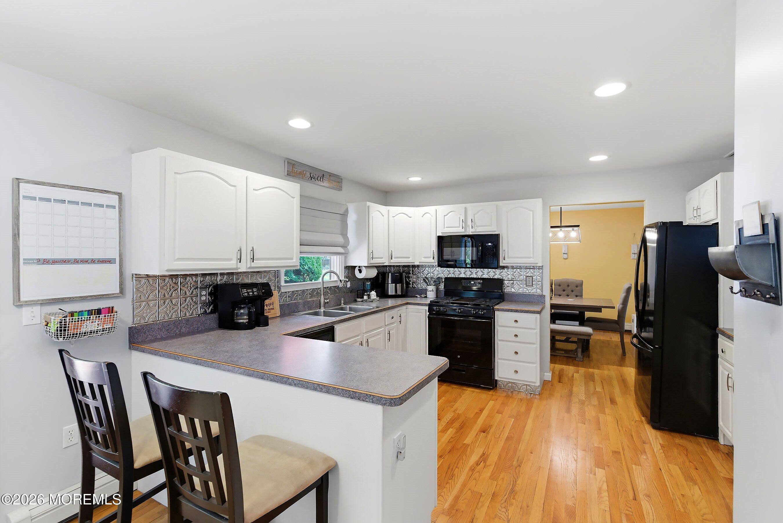 247 Toms River Road Jackson, NJ 08527 - Photo 13 of 37 09-Kitchen to Formal DIning