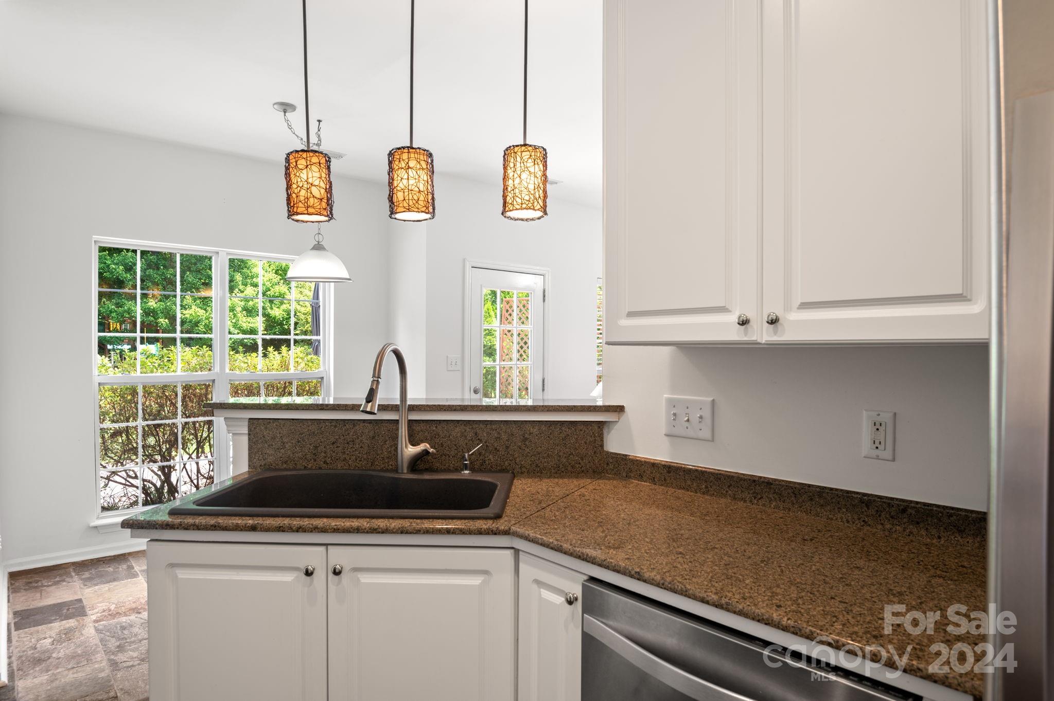 736 West Cheval Drive Fort Mill, SC 29708 - Photo 23 of 44 a kitchen with a sink and a window