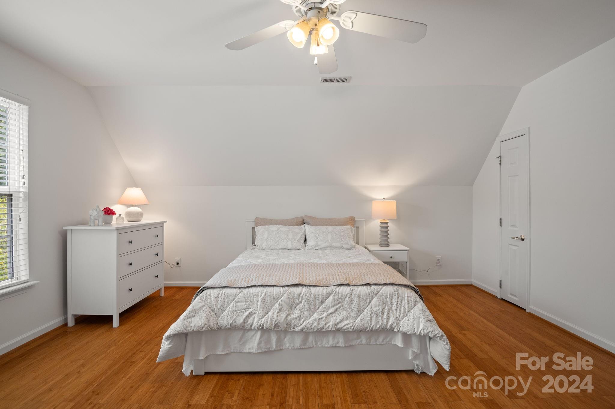736 West Cheval Drive Fort Mill, SC 29708 - Photo 28 of 44 a spacious bedroom with a bed and a window