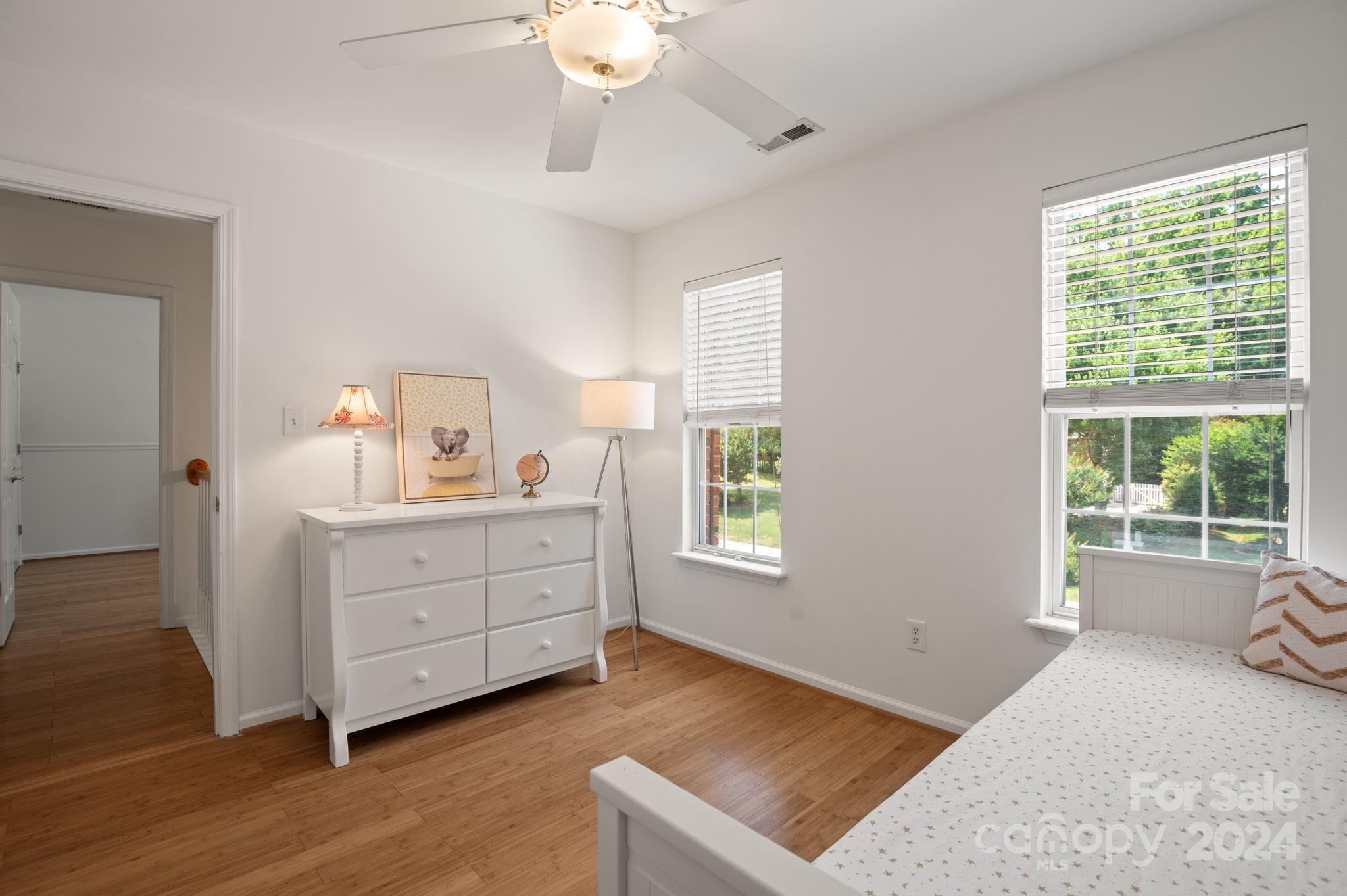 736 West Cheval Drive Fort Mill, SC 29708 - Photo 32 of 44 a bedroom with a bed and a window