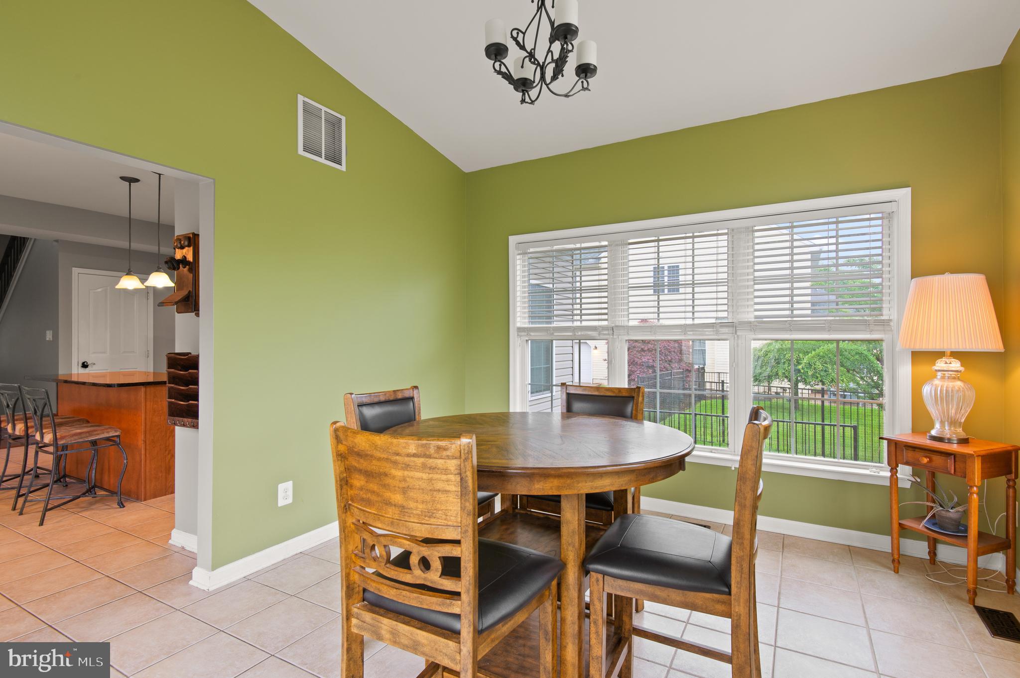985 Silver Maple Circle Seven Valleys, PA 17360 - Photo 14 of 50 a view of a dining room with furniture and a window