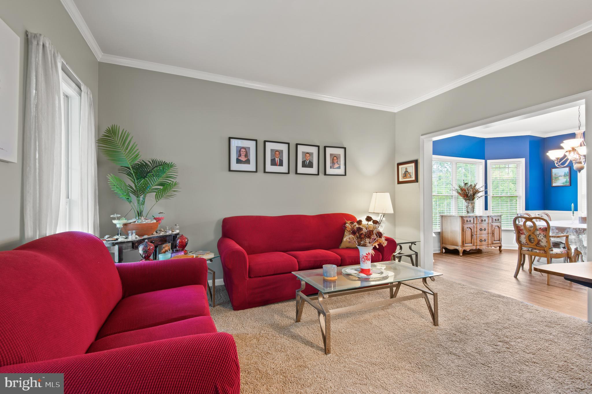 985 Silver Maple Circle Seven Valleys, PA 17360 - Photo 15 of 50 a living room with furniture and a large window