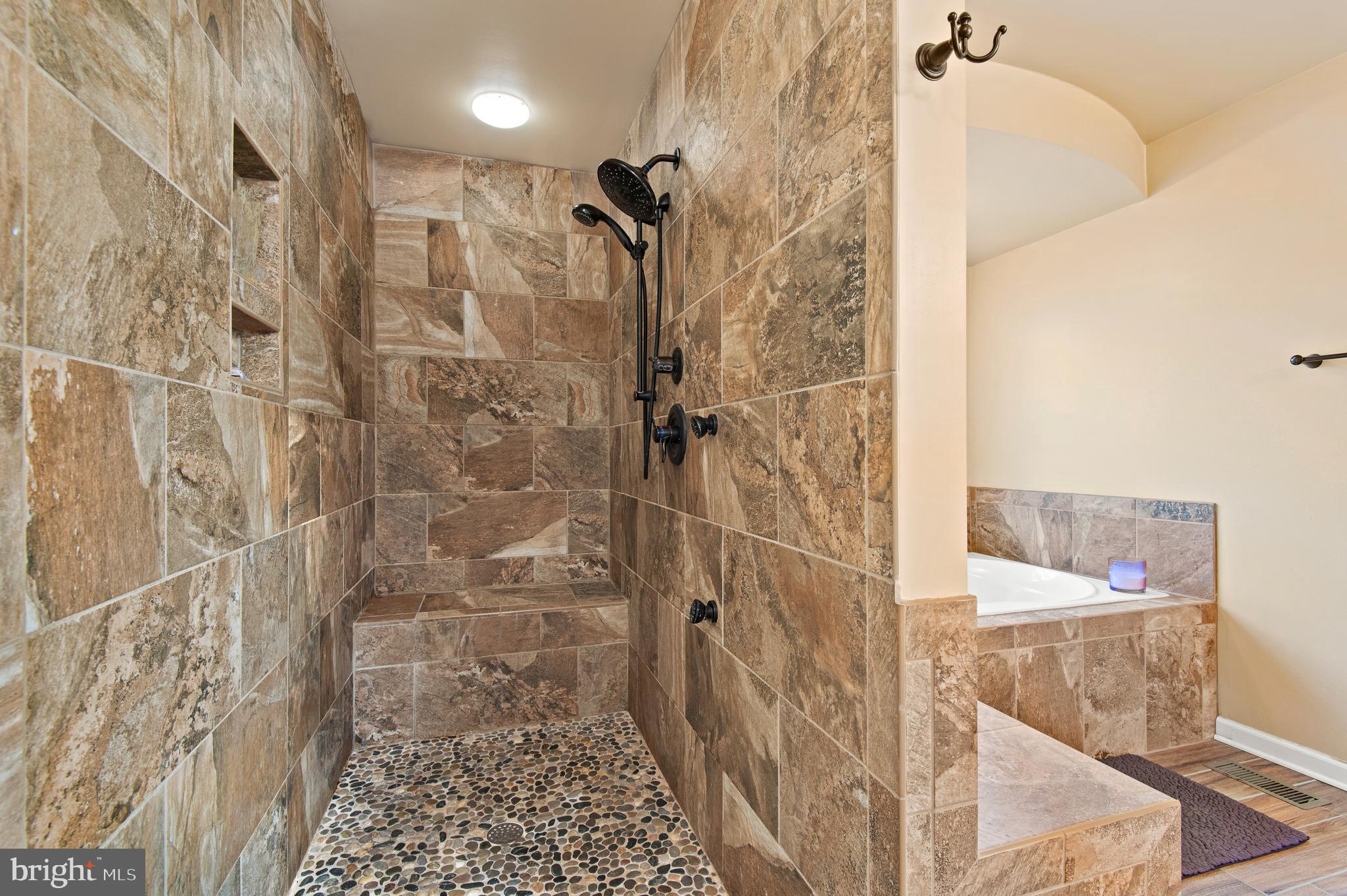 985 Silver Maple Circle Seven Valleys, PA 17360 - Photo 23 of 50 a bathroom with a shower