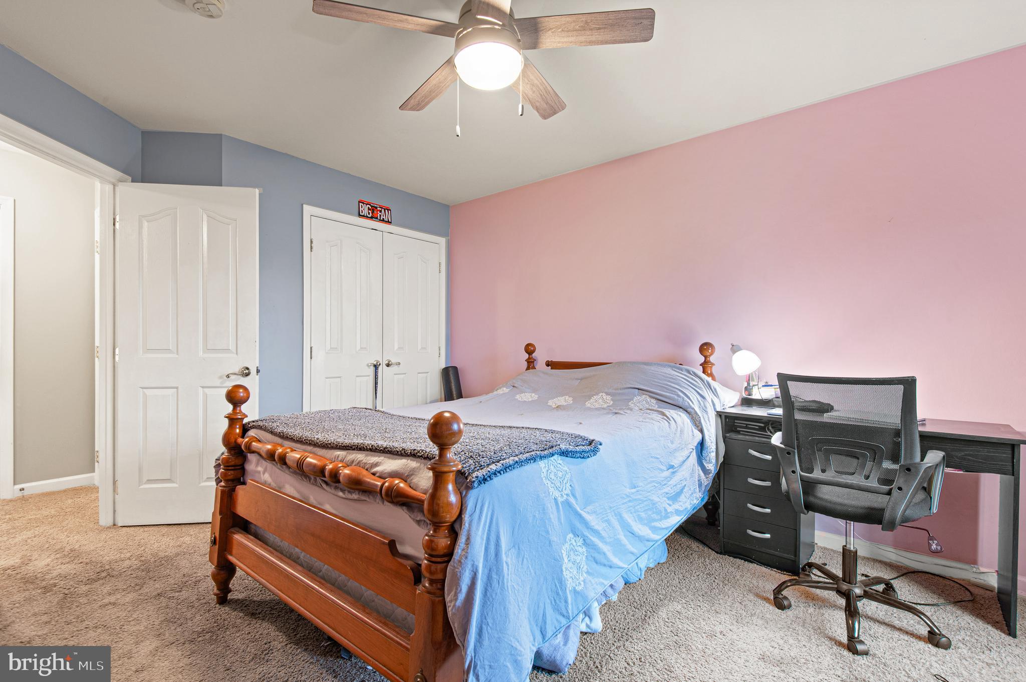 985 Silver Maple Circle Seven Valleys, PA 17360 - Photo 27 of 50 a bedroom with a bed and a chandelier
