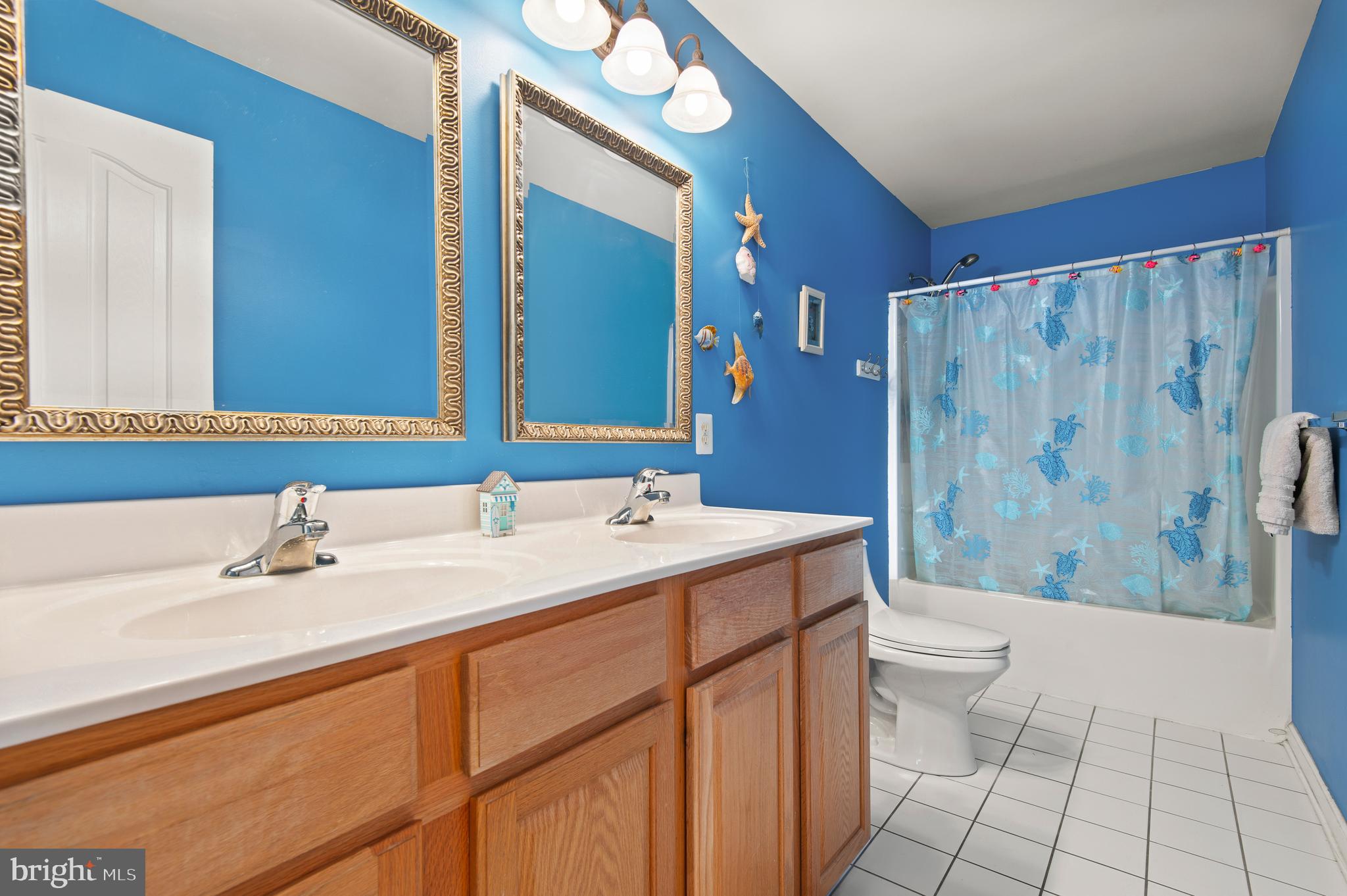 985 Silver Maple Circle Seven Valleys, PA 17360 - Photo 29 of 50 a bathroom with a sink a toilet and shower