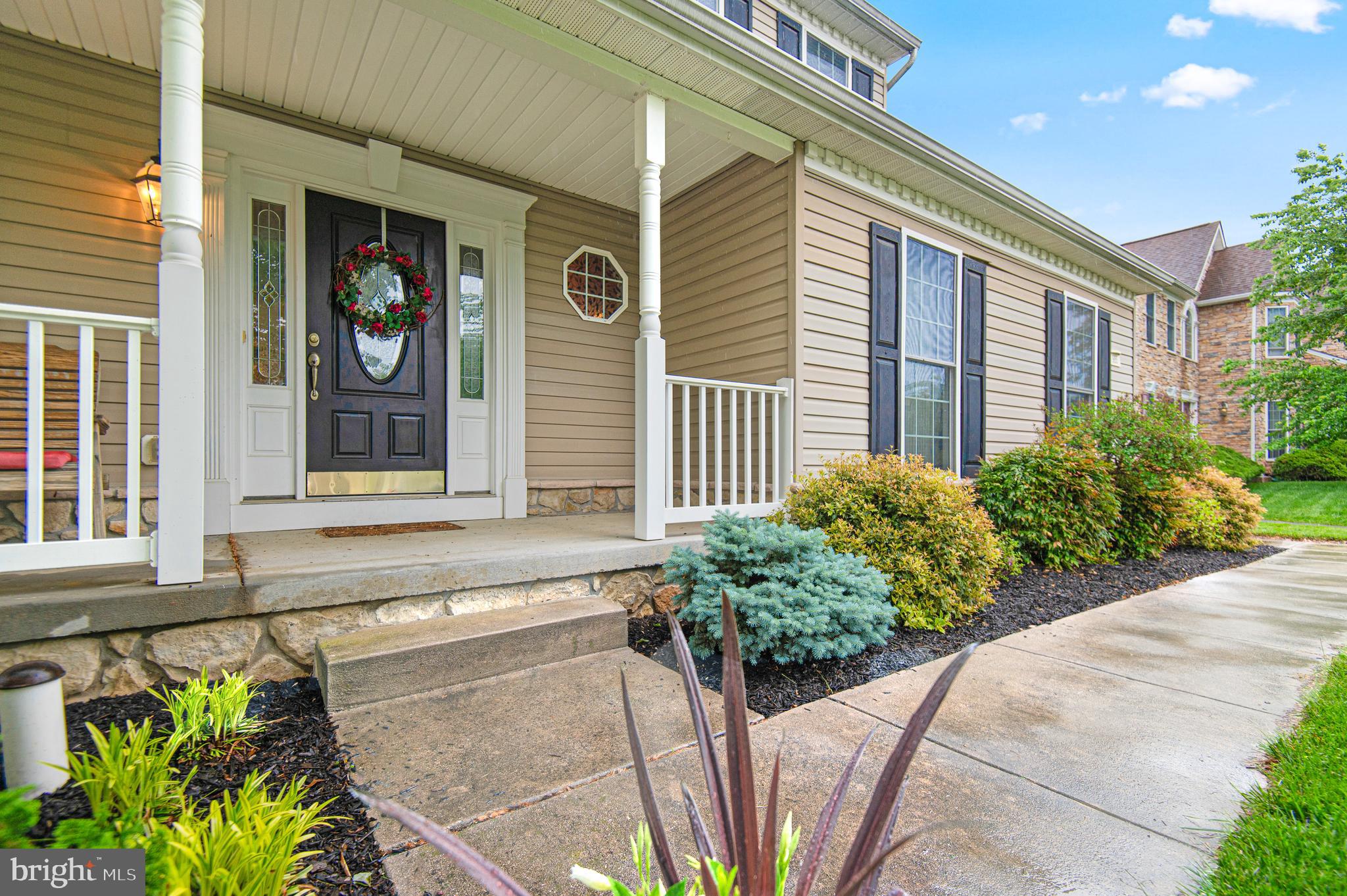985 Silver Maple Circle Seven Valleys, PA 17360 - Photo 3 of 50 a front view of a house with a yard