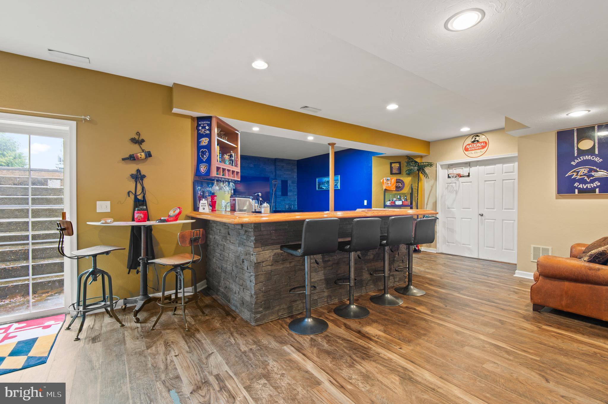 985 Silver Maple Circle Seven Valleys, PA 17360 - Photo 35 of 50 a living room with furniture a dining table and a potted plant
