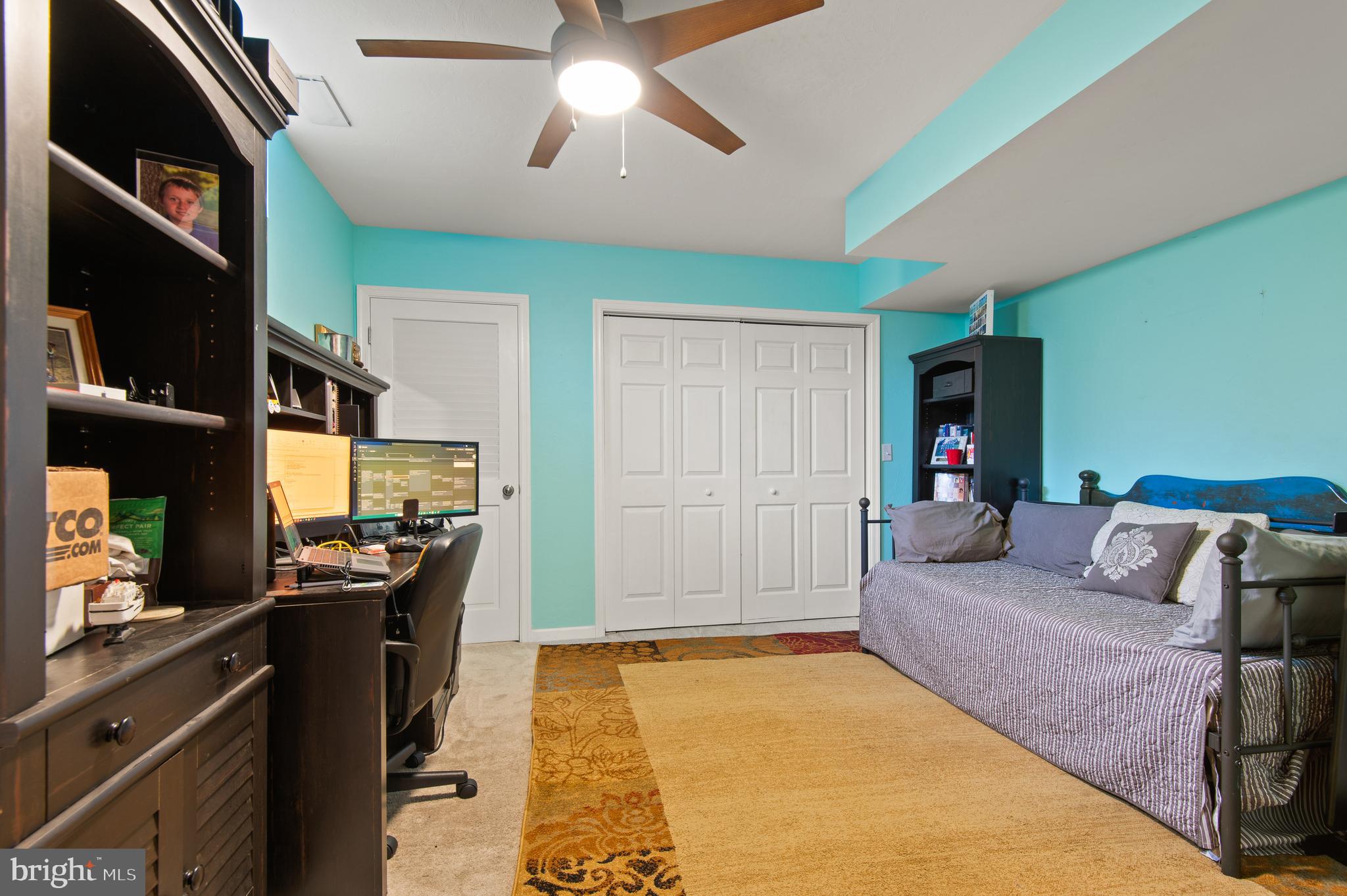 985 Silver Maple Circle Seven Valleys, PA 17360 - Photo 38 of 50 a living room with furniture and a flat screen tv
