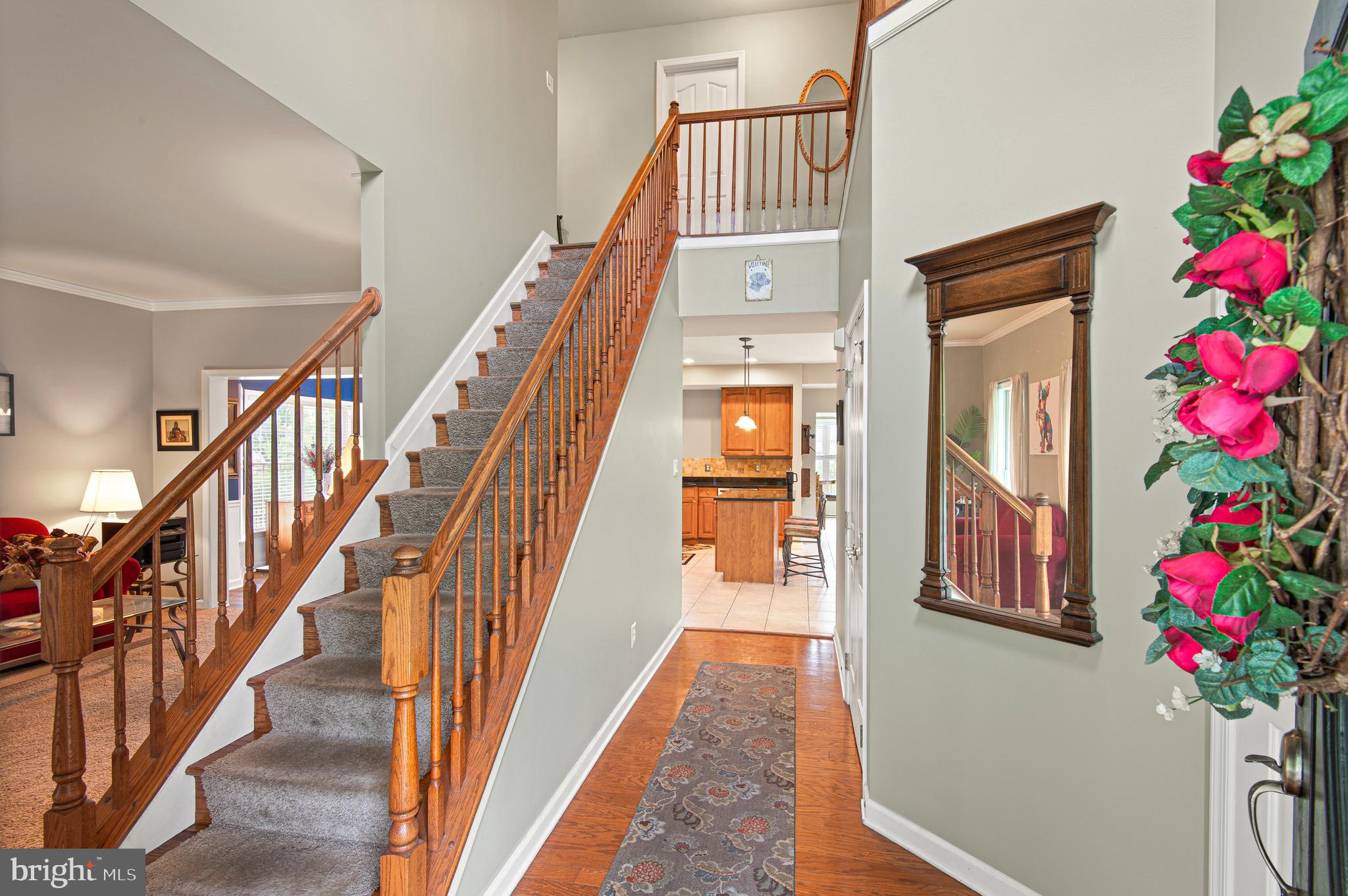 985 Silver Maple Circle Seven Valleys, PA 17360 - Photo 5 of 50 a view of an entryway with wooden floor and a front door
