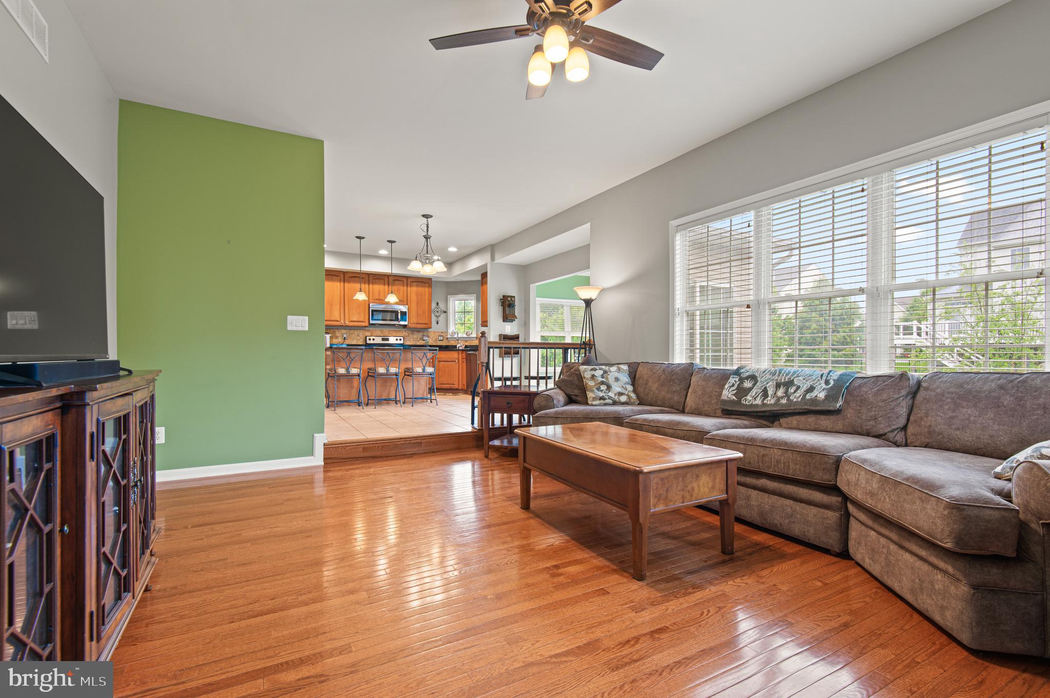 985 Silver Maple Circle Seven Valleys, PA 17360 - Photo 7 of 50 a living room with furniture and a flat screen tv