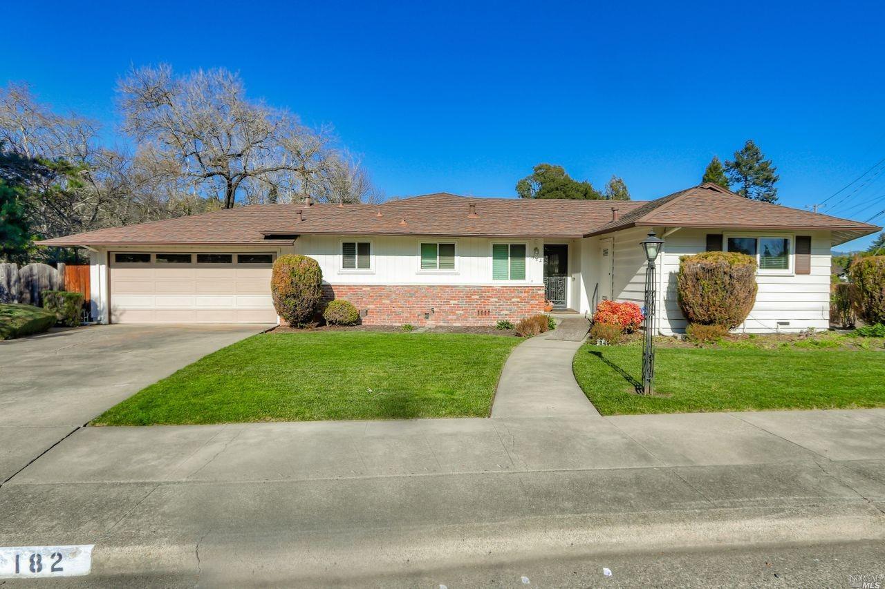 182 Webb Drive Santa Rosa, CA 95405 - Photo 1 of 1 a front view of a house with a garden and plants