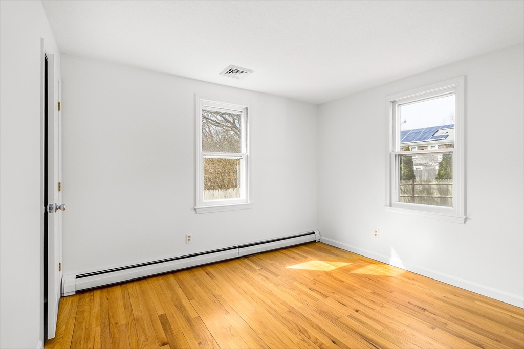 64 McNamara Road Yarmouth, MA 02673 - Photo 12 of 28 an empty room with a window