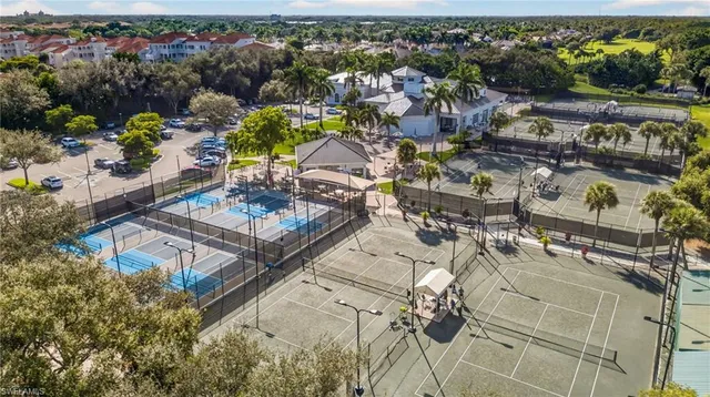 an aerial view of residential house with outdoor space and swimming pool