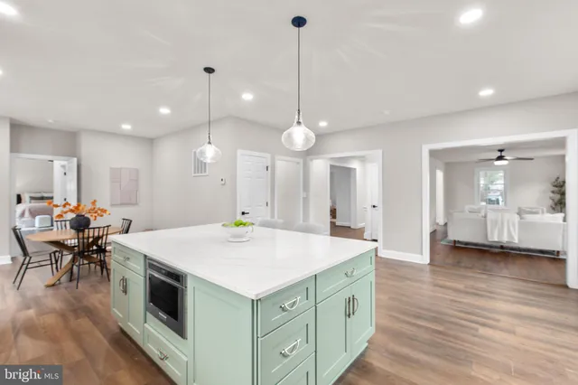 a bathroom with a shower and a sink