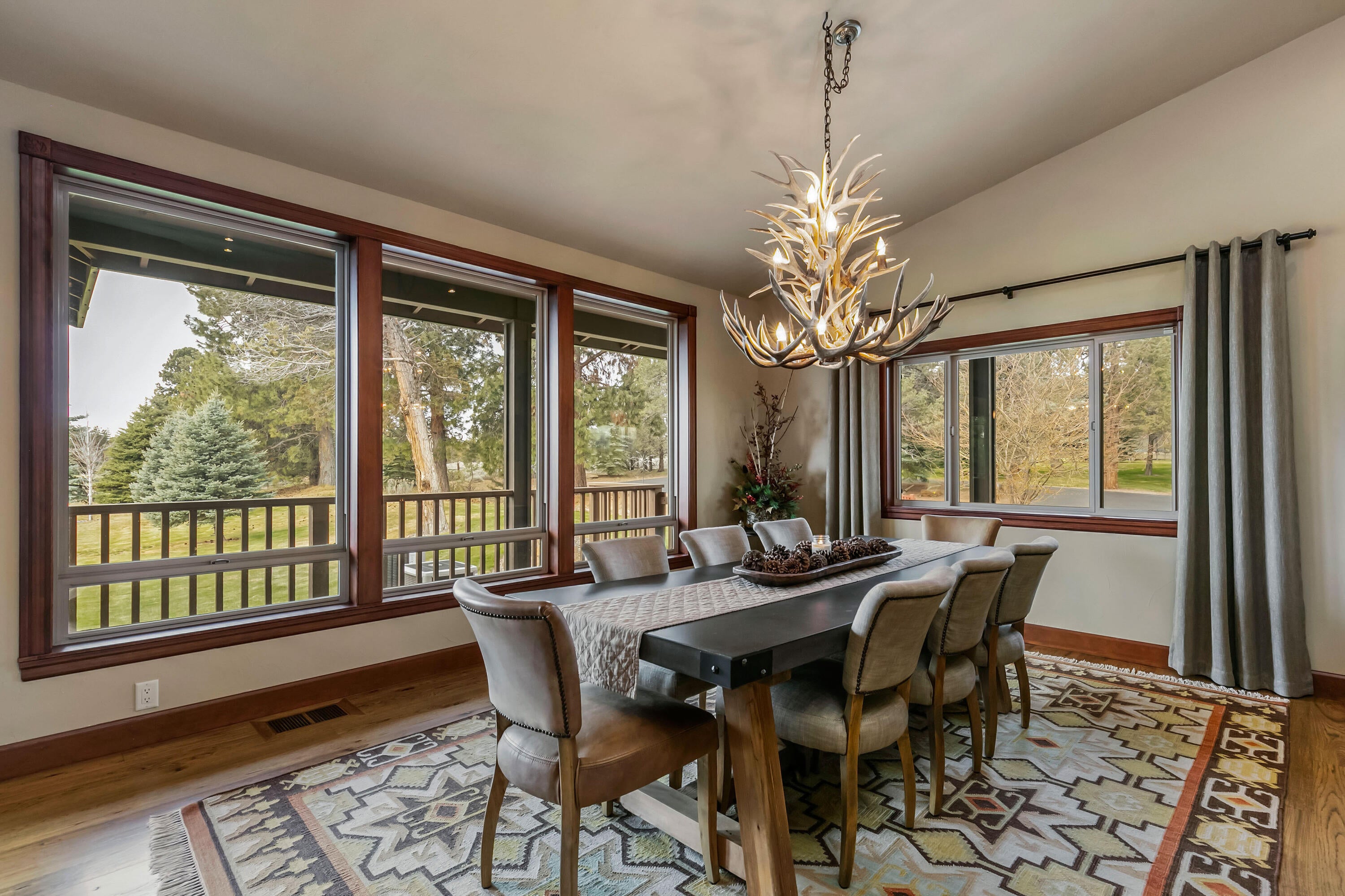 69015 Hurtley Ranch Road Sisters, OR 97759 - Photo 16 of 88 Dining area with expansive windows and mountain views