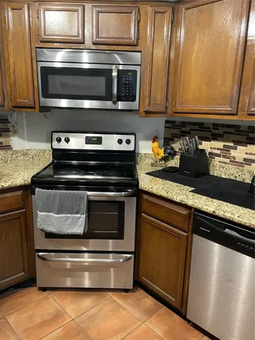 a bedroom with a bed and dresser