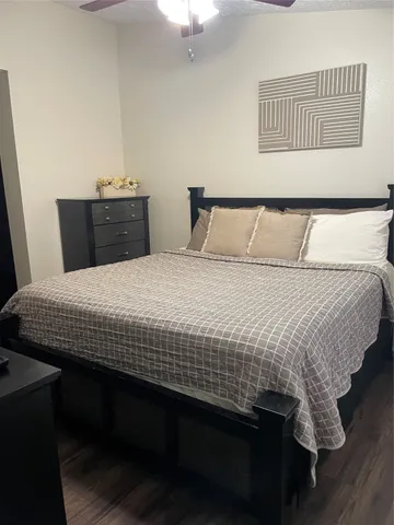a living room with furniture and window