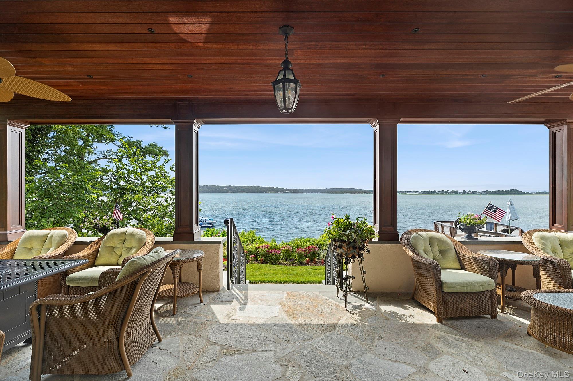 353 Centre Island Road Oyster Bay, NY 11771 - Photo 12 of 34 a view of an outdoor dining space with furniture