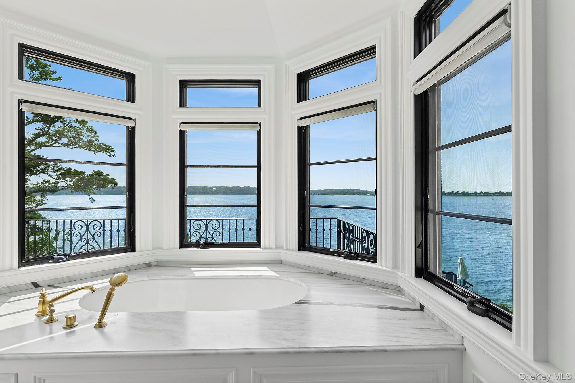 353 Centre Island Road Oyster Bay, NY 11771 - Photo 15 of 34 a view of an entryway with a fireplace