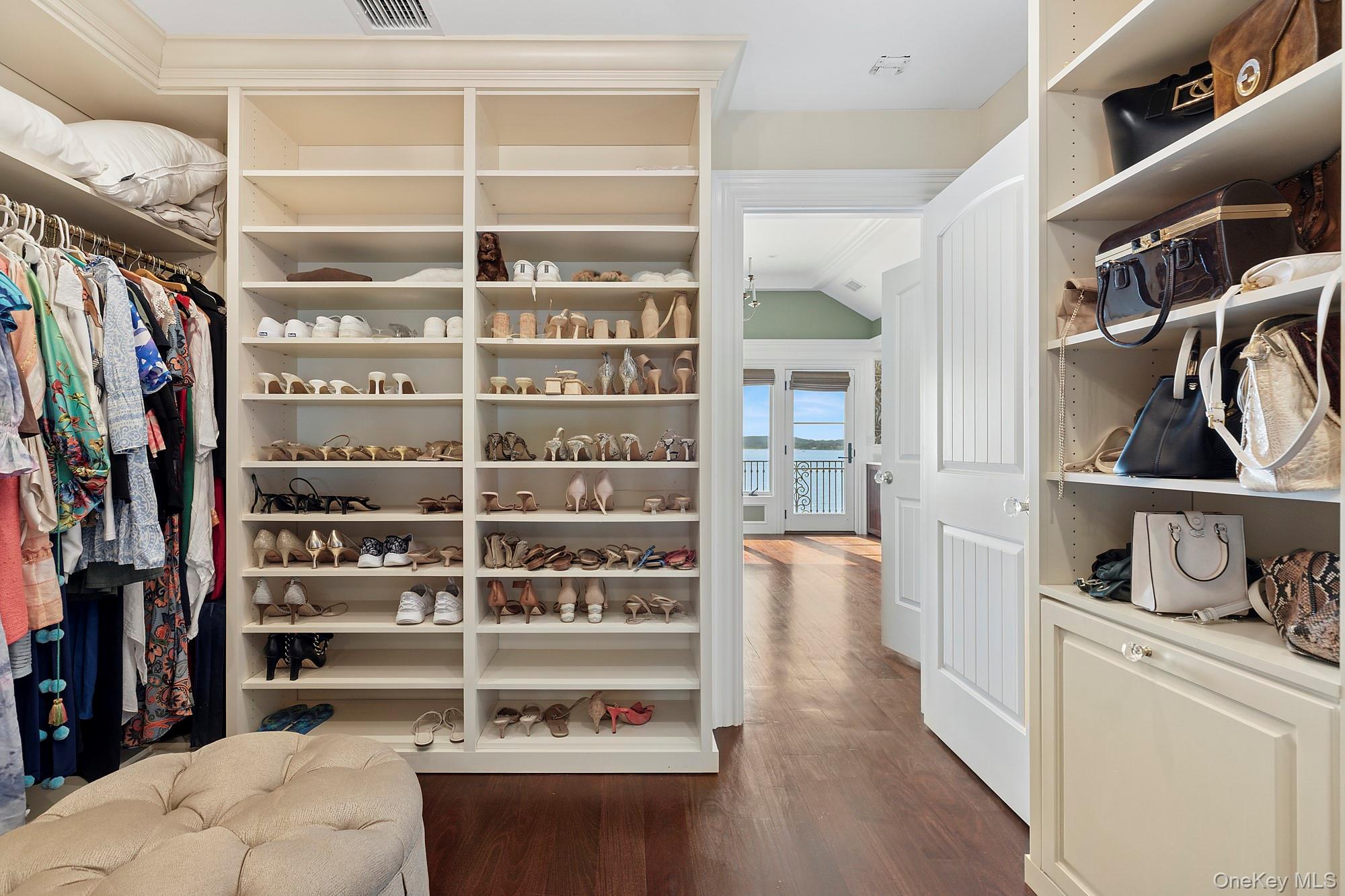 353 Centre Island Road Oyster Bay, NY 11771 - Photo 19 of 34 a view of walk in closet with clothes and shoes