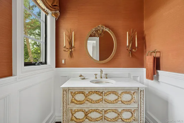 a very nice looking room with a large window and storage space