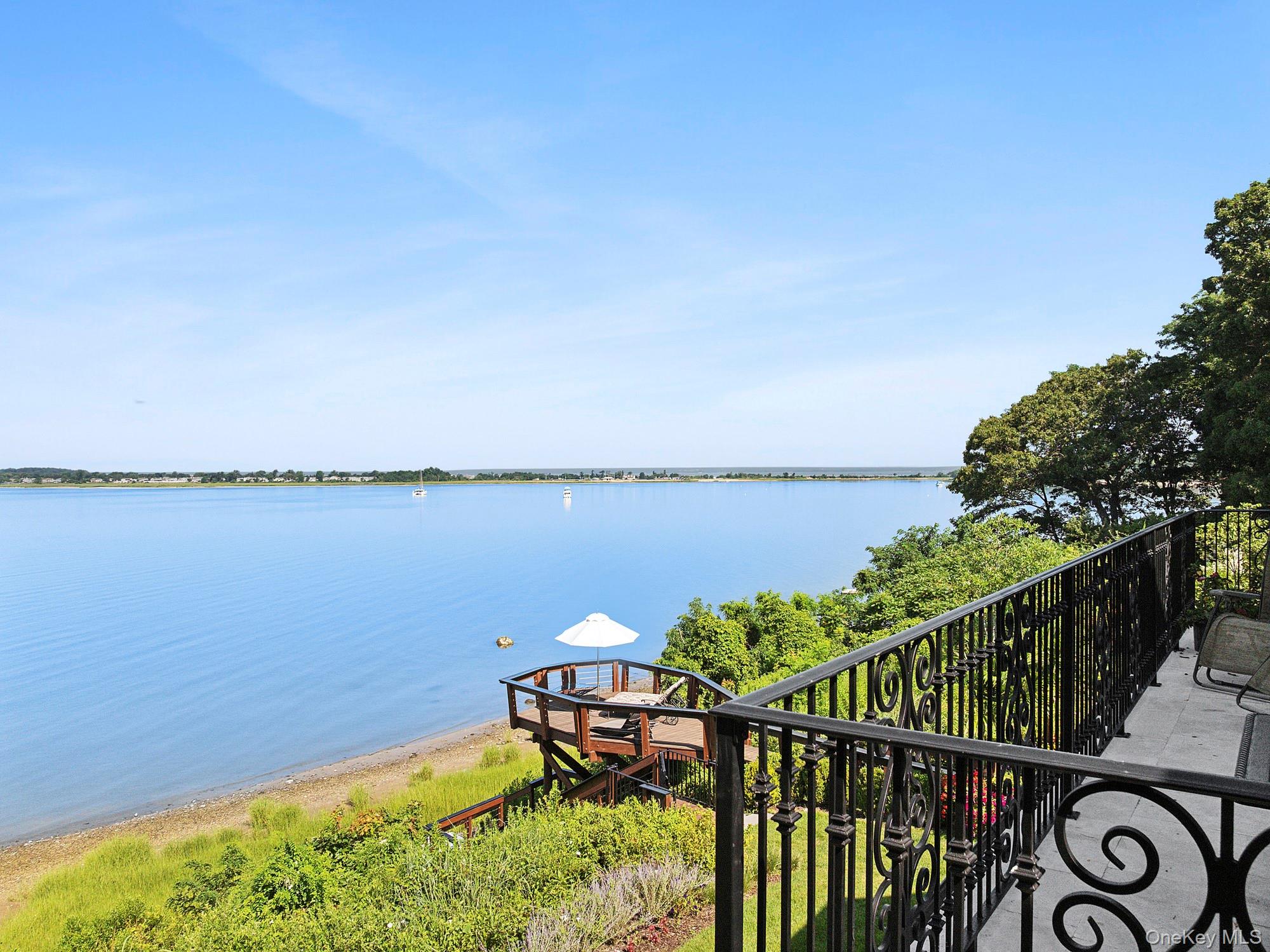 353 Centre Island Road Oyster Bay, NY 11771 - Photo 26 of 34 a view of a ocean from a balcony