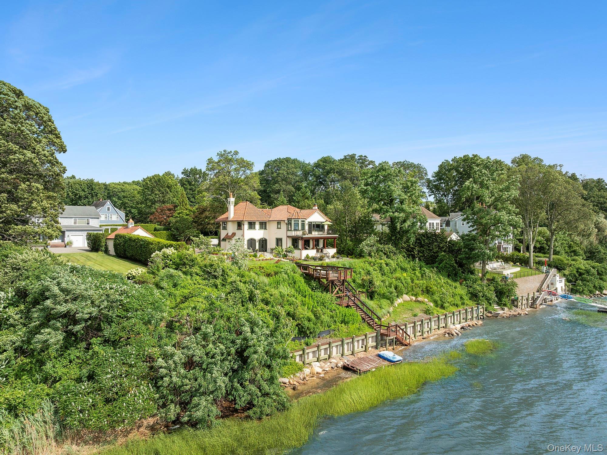 353 Centre Island Road Oyster Bay, NY 11771 - Photo 34 of 34 a view of a garden with a building in the background