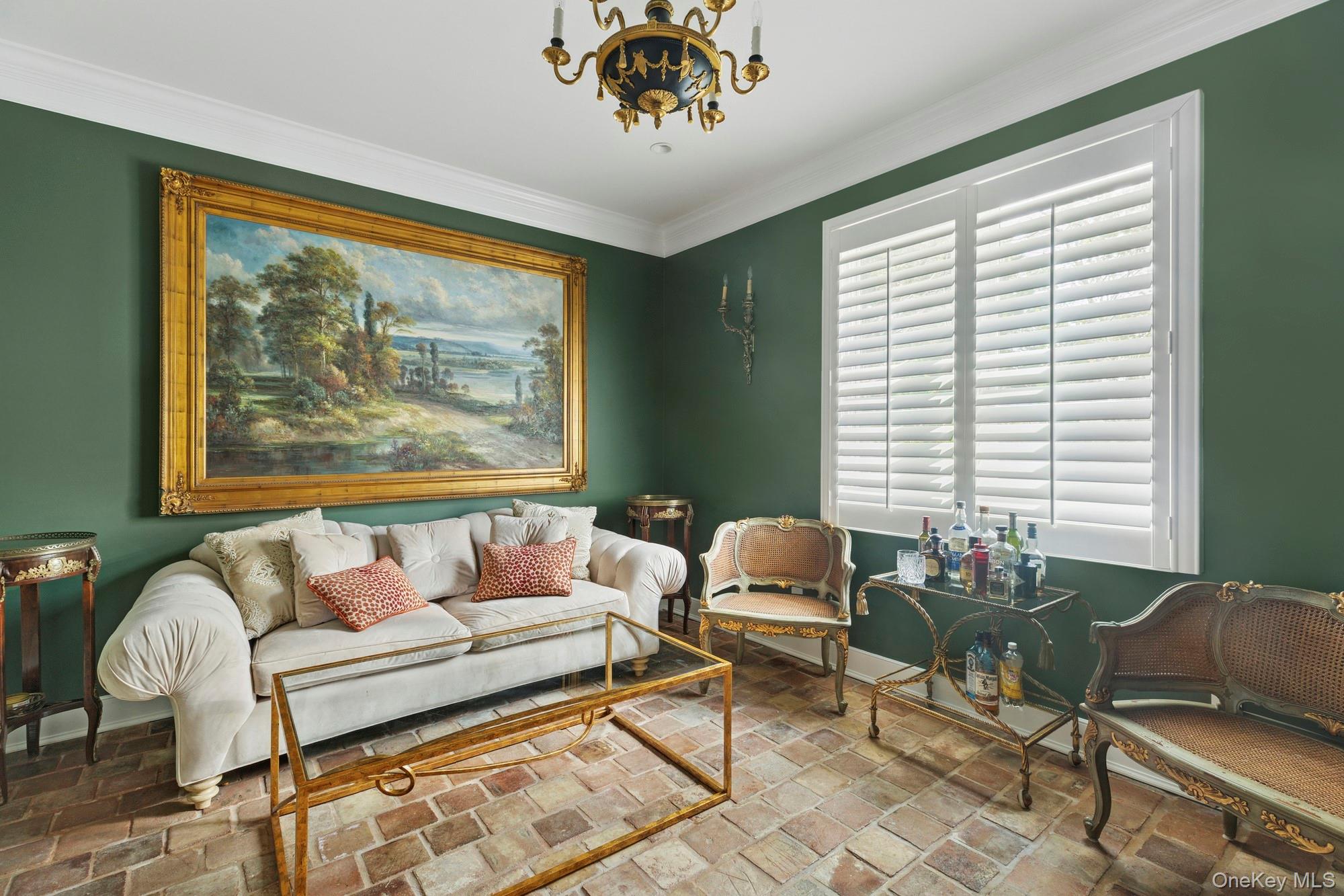 353 Centre Island Road Oyster Bay, NY 11771 - Photo 7 of 34 a living room with furniture and a large window with garden view