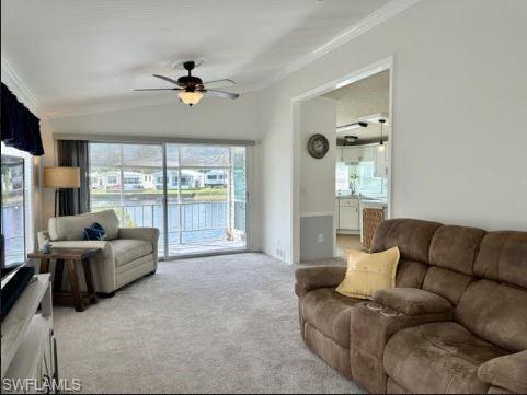 398 Leopard Lane, Unit 398 Naples, FL 34114 - Photo 15 of 50 a living room with furniture and a large window