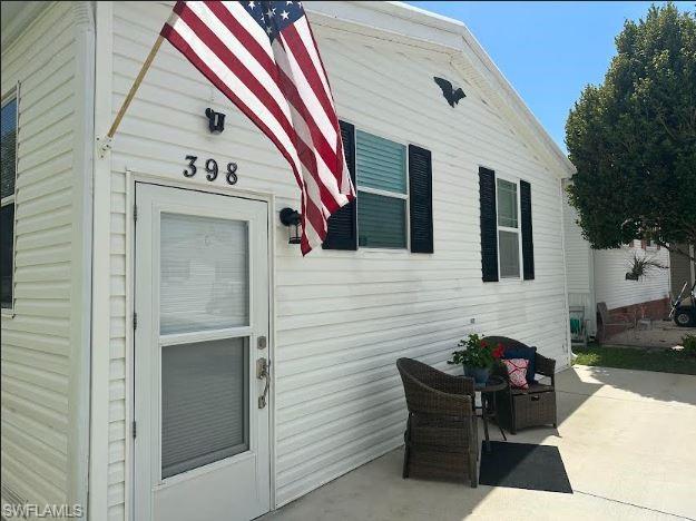 398 Leopard Lane, Unit 398 Naples, FL 34114 - Photo 2 of 50 a view of balcony and deck