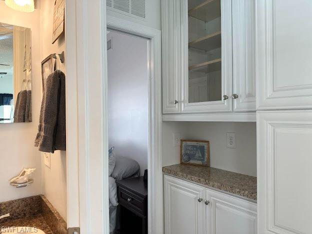 398 Leopard Lane, Unit 398 Naples, FL 34114 - Photo 30 of 50 a kitchen with a sink and refrigerator