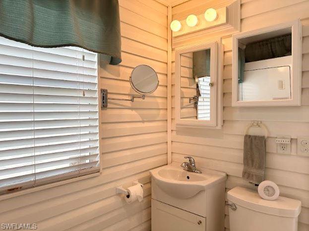 398 Leopard Lane, Unit 398 Naples, FL 34114 - Photo 36 of 50 a bathroom with a sink a toilet and shower