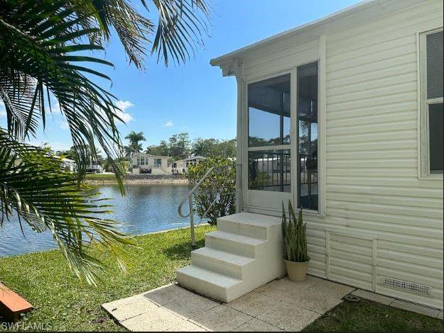 398 Leopard Lane, Unit 398 Naples, FL 34114 - Photo 4 of 50 a view of a patio in front of house