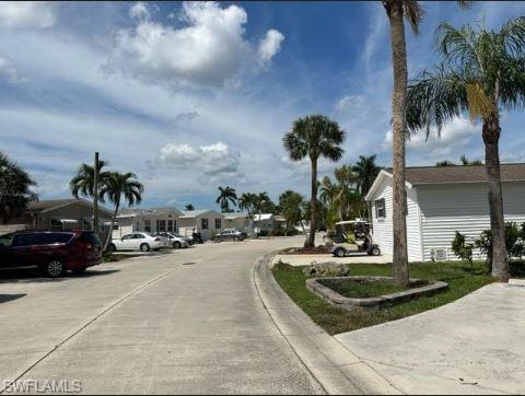 398 Leopard Lane, Unit 398 Naples, FL 34114 - Photo 42 of 50 a view of a backyard