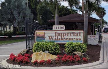 398 Leopard Lane, Unit 398 Naples, FL 34114 - Photo 43 of 50 a view of a sign board