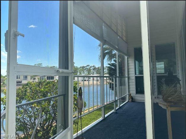398 Leopard Lane, Unit 398 Naples, FL 34114 - Photo 8 of 50 a view of a balcony