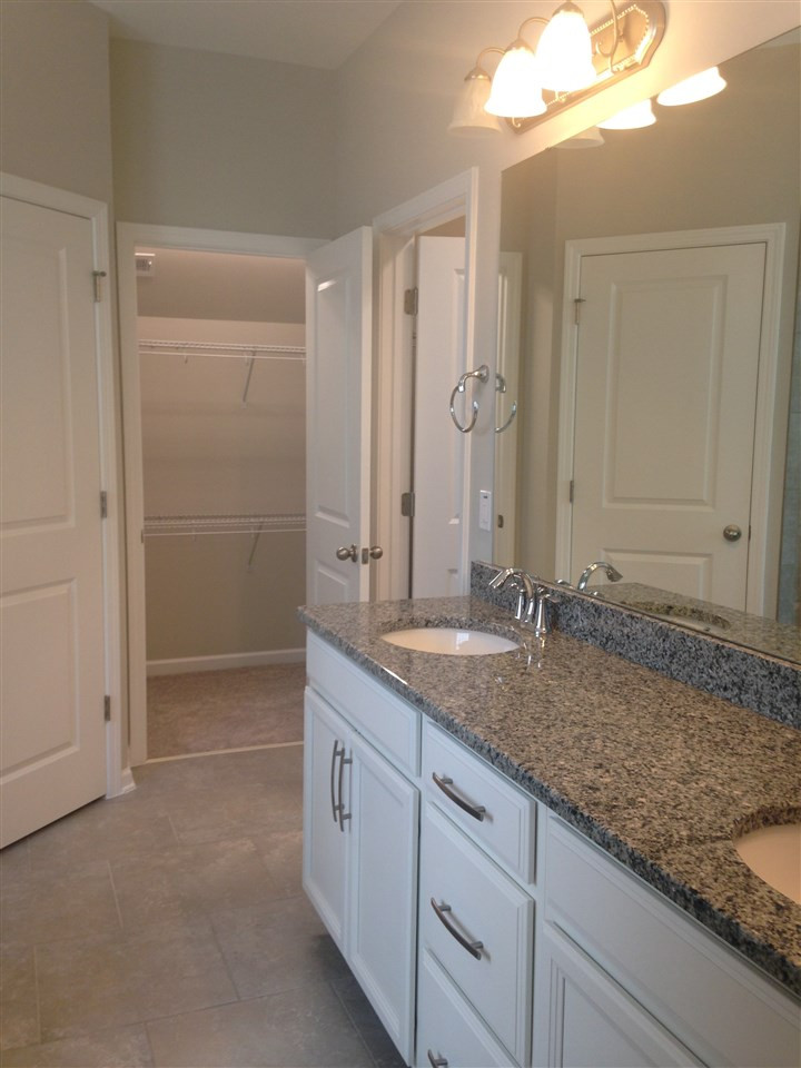846 Wickham Ridge Road, Unit 1 Apex, NC 27539 - Photo 12 of 25 Relax in your Master Spa with His and Hers Closets