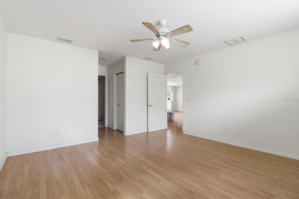 5120 East Hopp Lane Inverness, FL 34452 - Photo 21 of 26 a view of an empty room and wooden floor