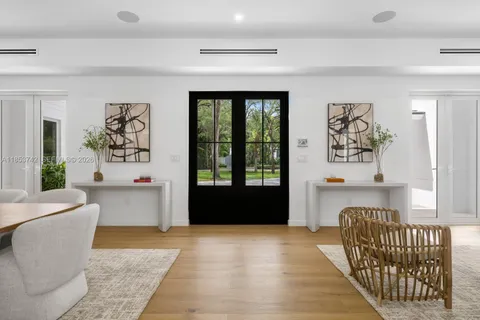 a living room with a couch and a large window